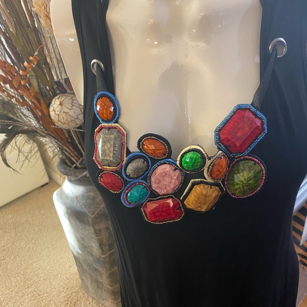 Black  top with jewellery